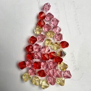 Swarovski 8mm Bicones in. mixed colors. 40 in lot Original and genuine  New